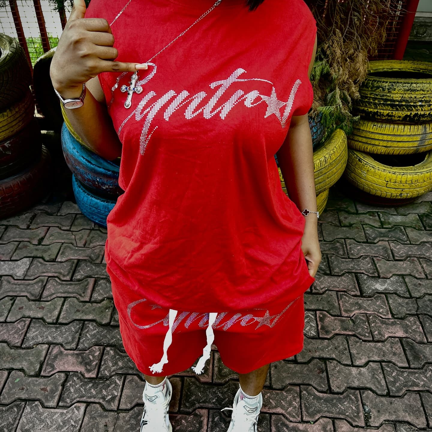 Closeup red Cyntral tee and shorts set